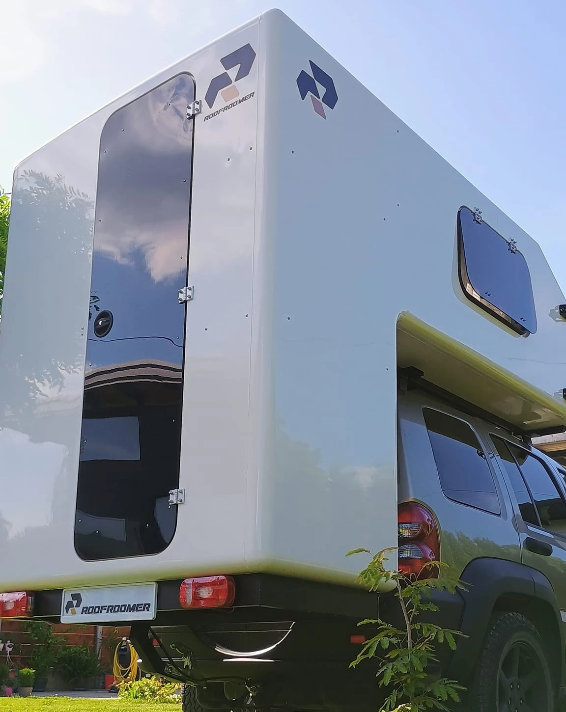 The Roofroomer doors runs most of the height of the exterior wall for comfortable ingress and egress