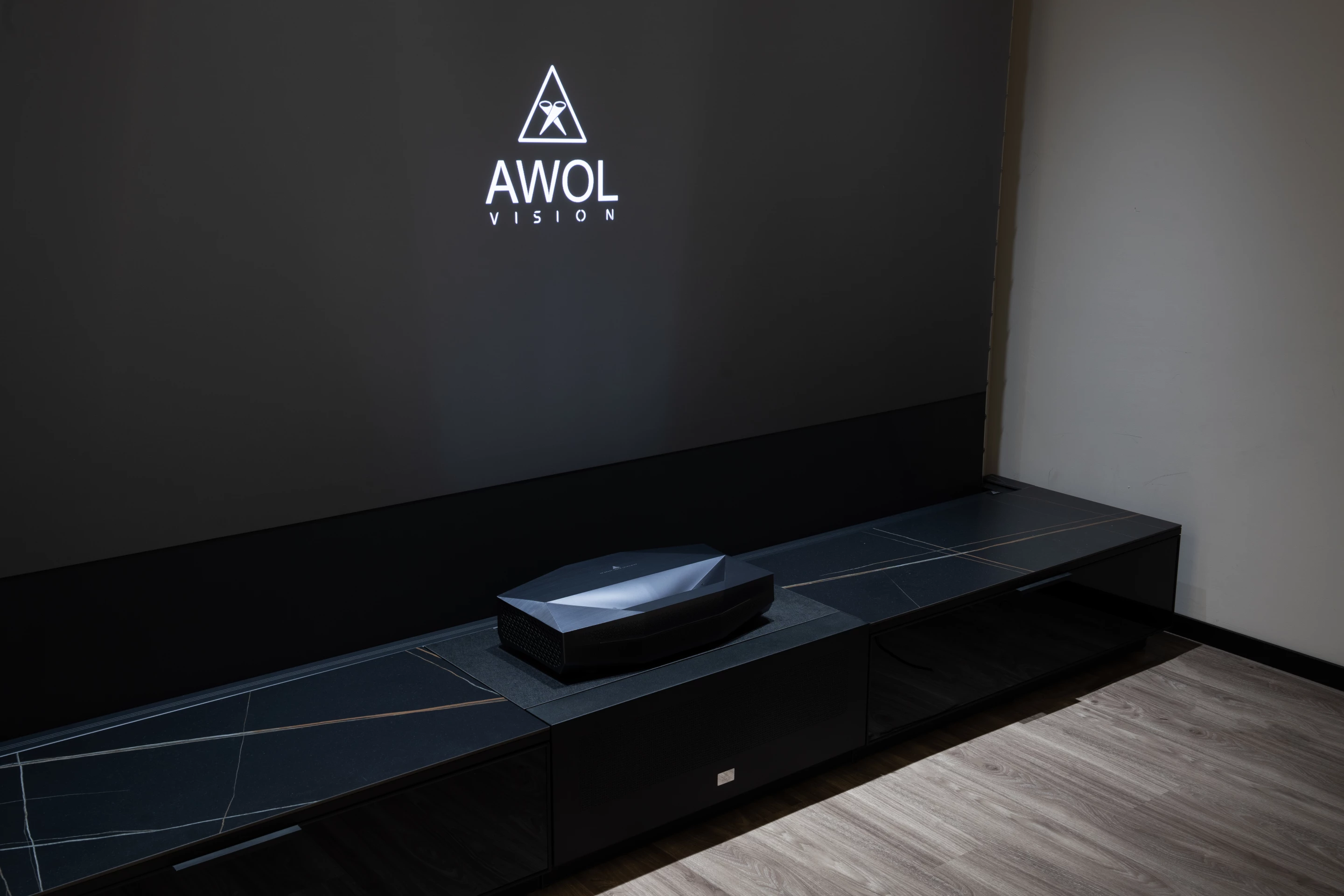 The Aetherion tri-laser UST projector at AWOL's booth in the Las Vegas Convention Center during CES