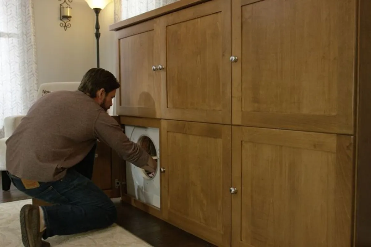 Clean, dry, unfolded clothes are simply placed in the ThreadRobe's bin