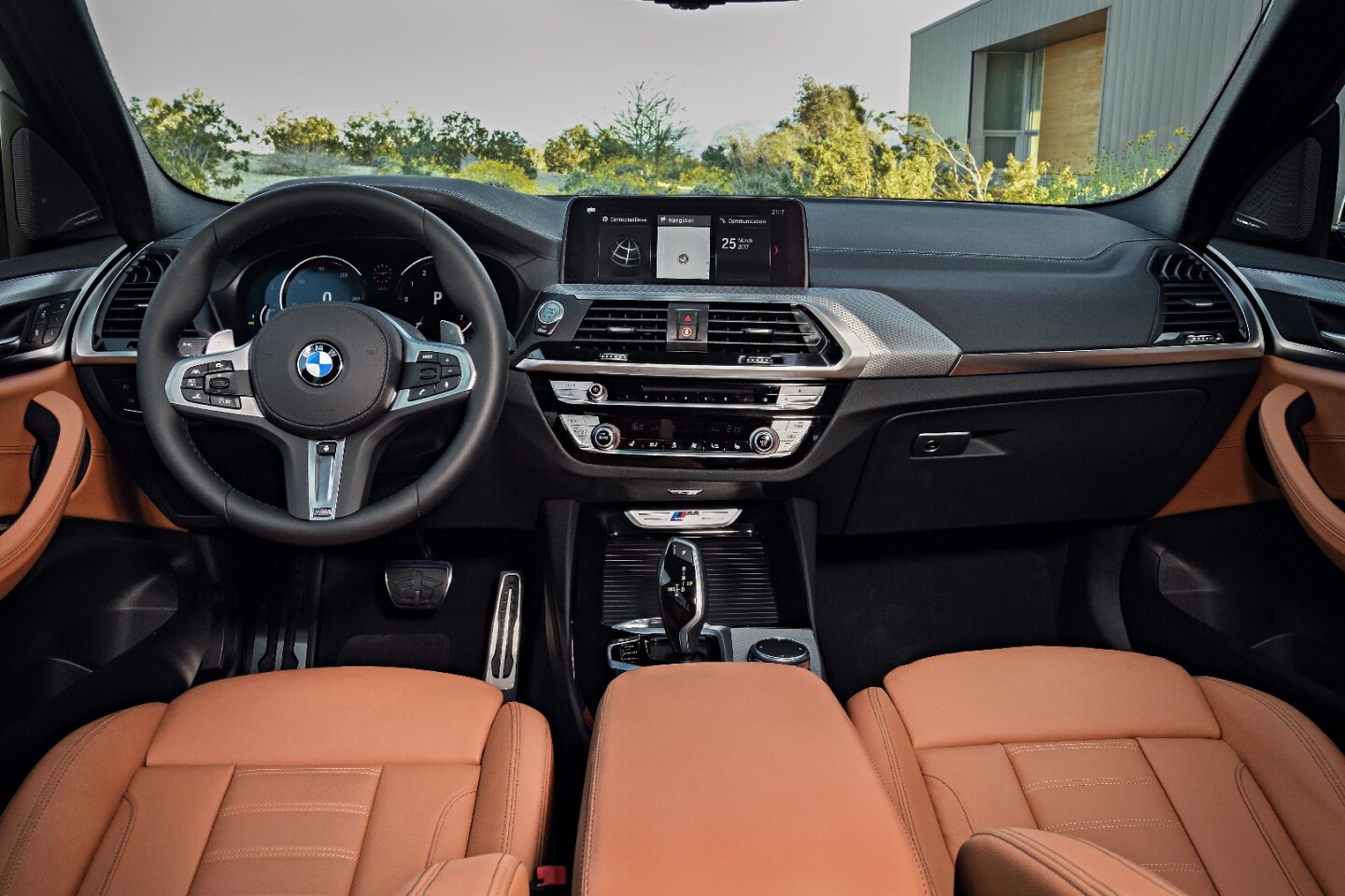 The interior of the BMW X3 borrows heavily from its more expensive brothers