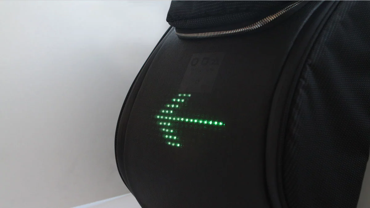 The SEIL unit is slotted into a bag so that the LEDs face a 1 mm-thick semi-transparent polycarbonate panel