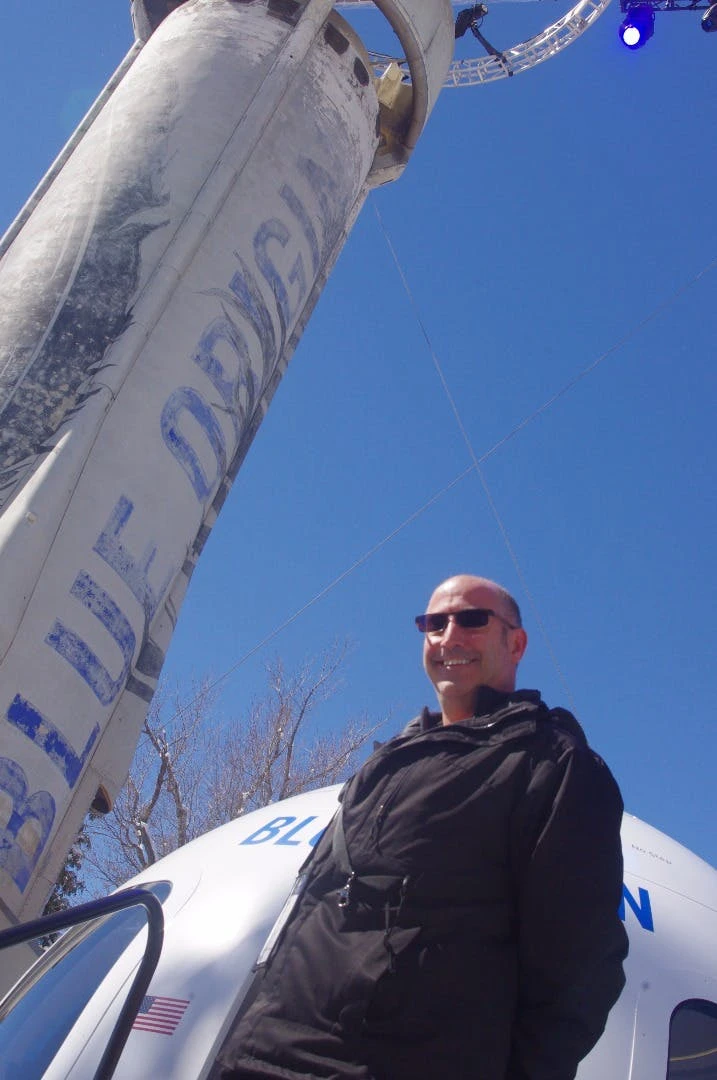 New Atlas' Michael Franco outside the and New Shepard rocket