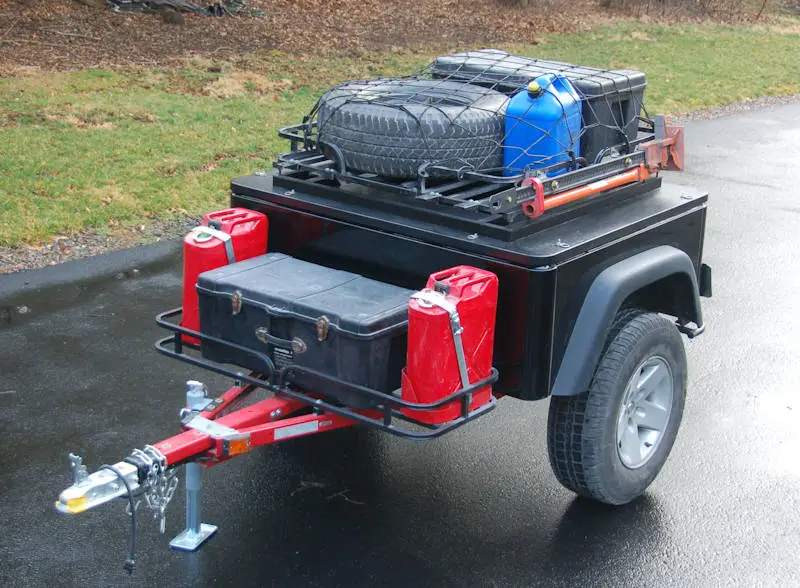 Cargo options include netting, spare tire mount, tie downs and nose box