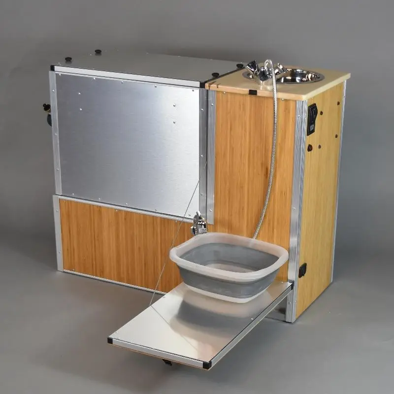 The TK Van Kitchen has a drop-down work surface for outside use