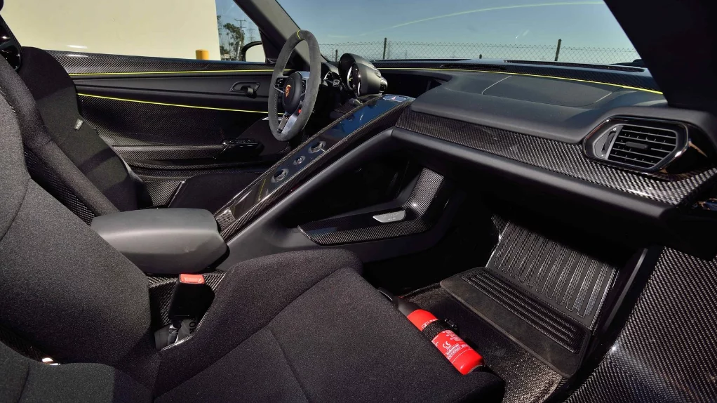 The cabin is black, and stripped out for maximum focus