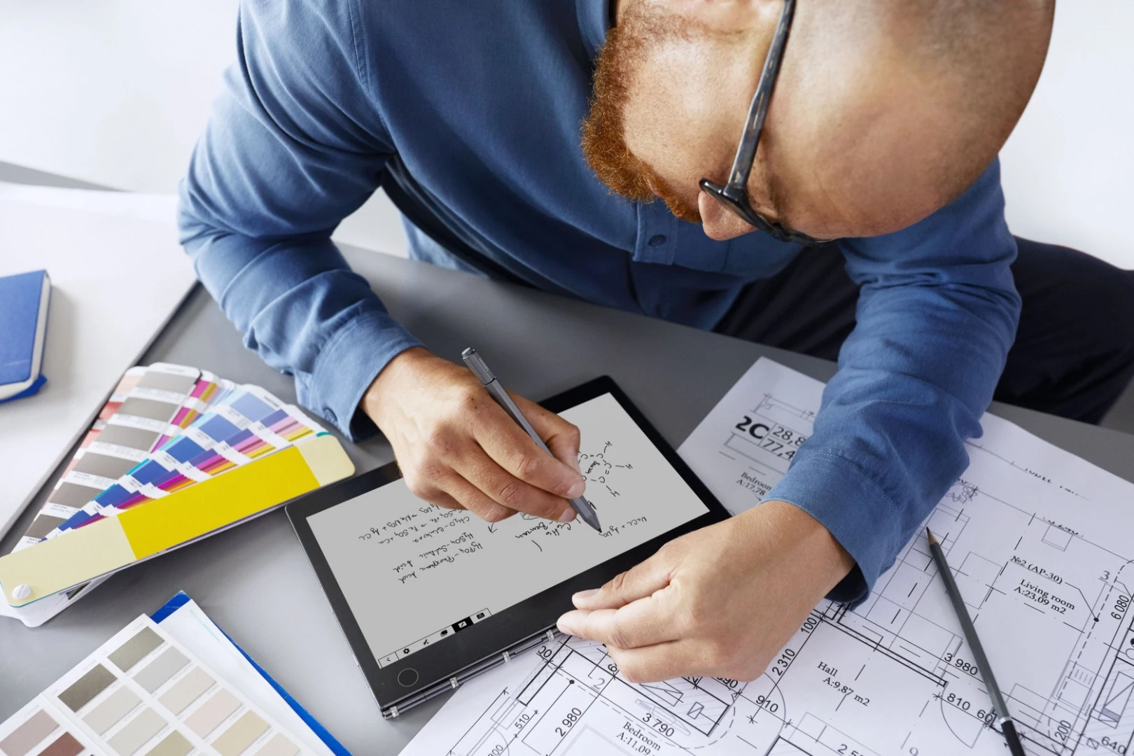 An E Ink display on the Yoga Book C930 serves as a notepad, sketchbook, eReader and touch-enabled keyboard