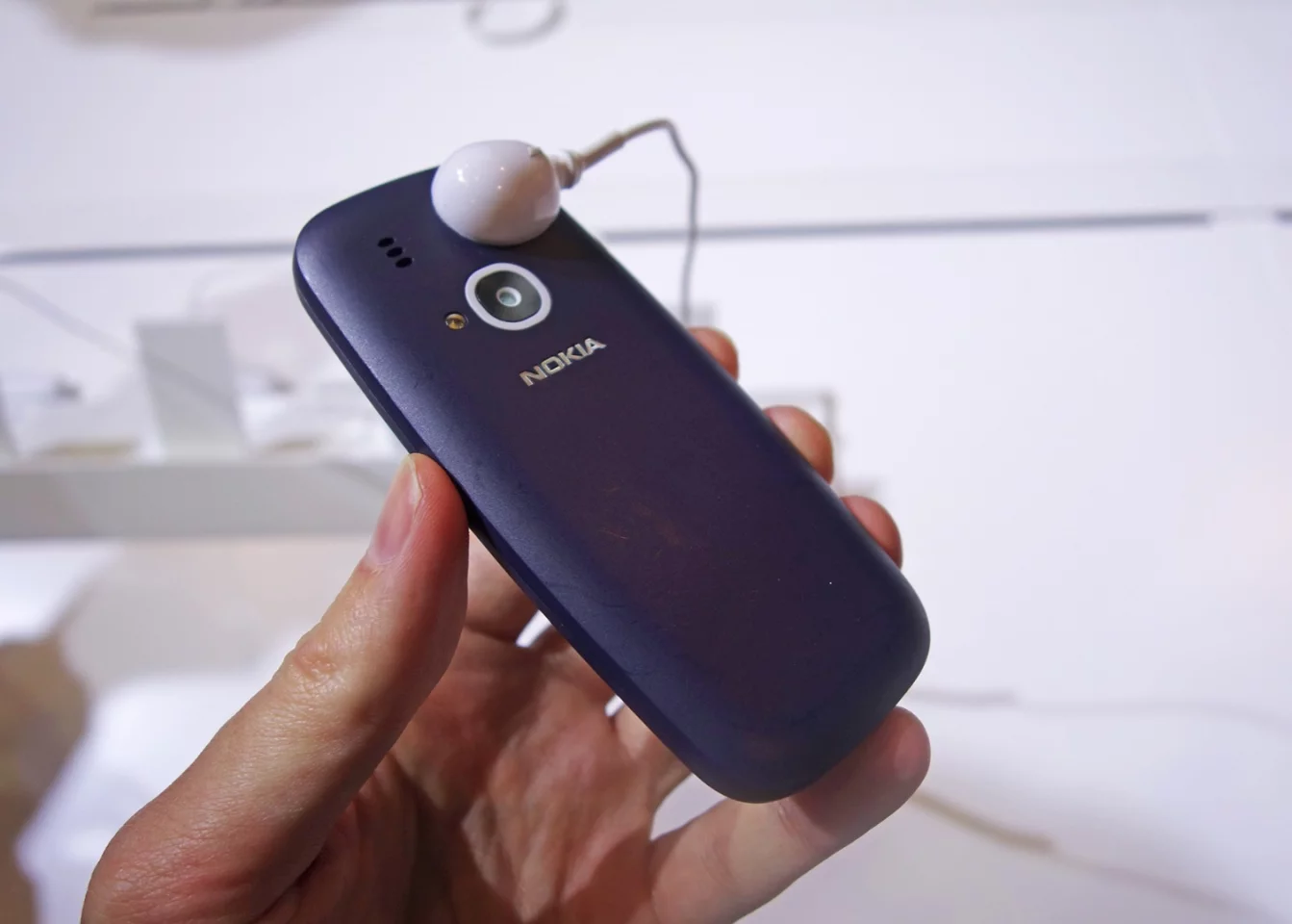 Around the back there's a 2 MP camera (your model won't have this security cable attached to it)