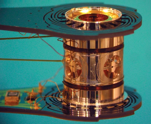 A metalic case called a hohlraum holds the fuel capsule for NIF experiments