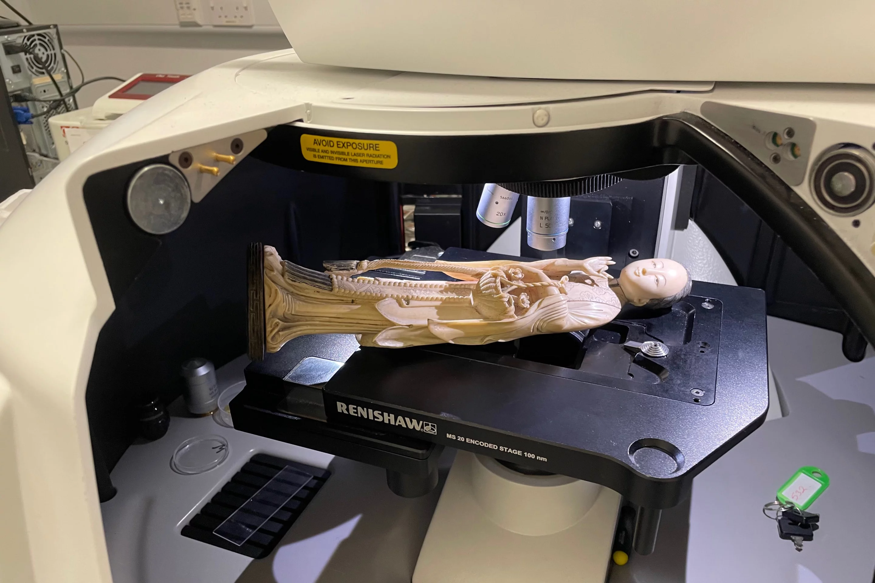An ivory figurine undergoes Raman spectroscopy analysis as part of the study