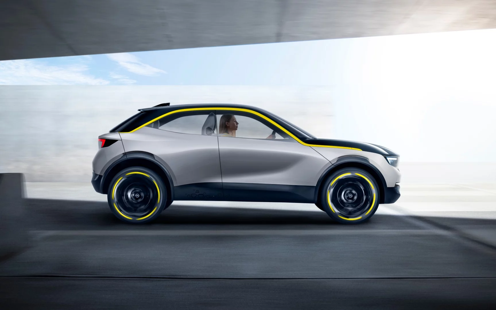 Opel GT X Experimental concept: clearly posed on a stage, with wheels motion-blurred to look like it's moving for some reason