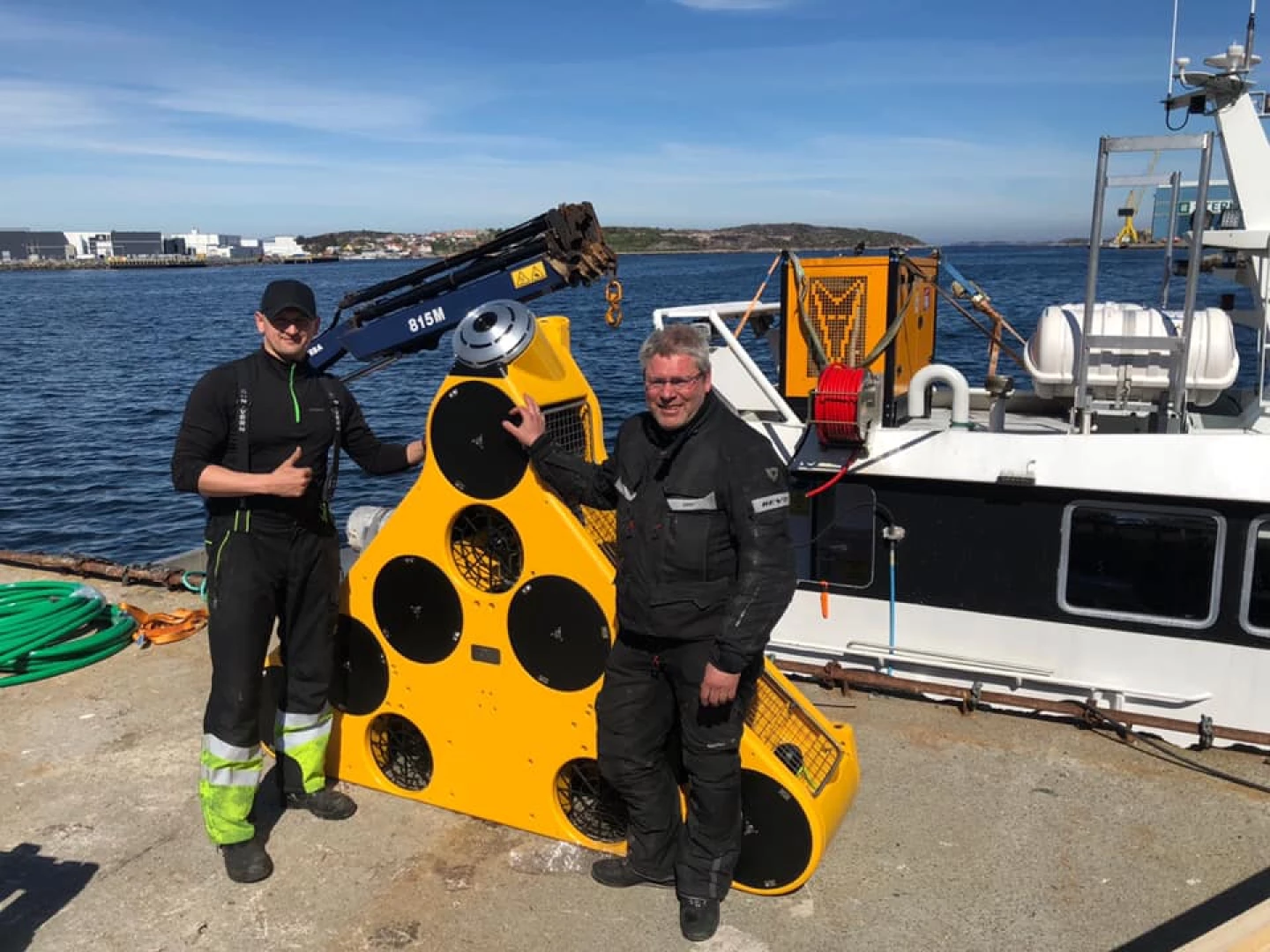 Triangular ROV cleans up fish farm nets