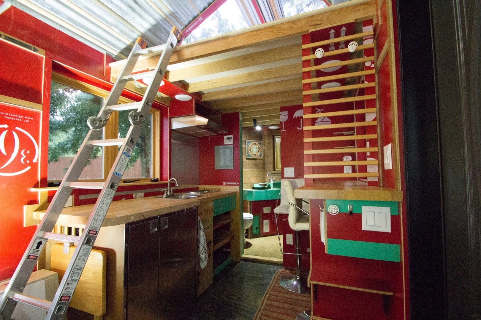 Access to the upstairs sleeping loft is gained via ladder