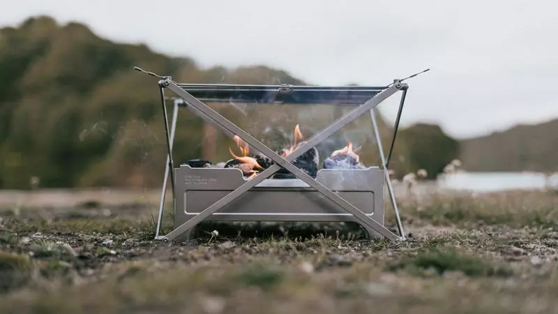 The Wolf and Grizzly Fire Safe works seamlessly with the Grill for cooking, then folds down to envelope size
