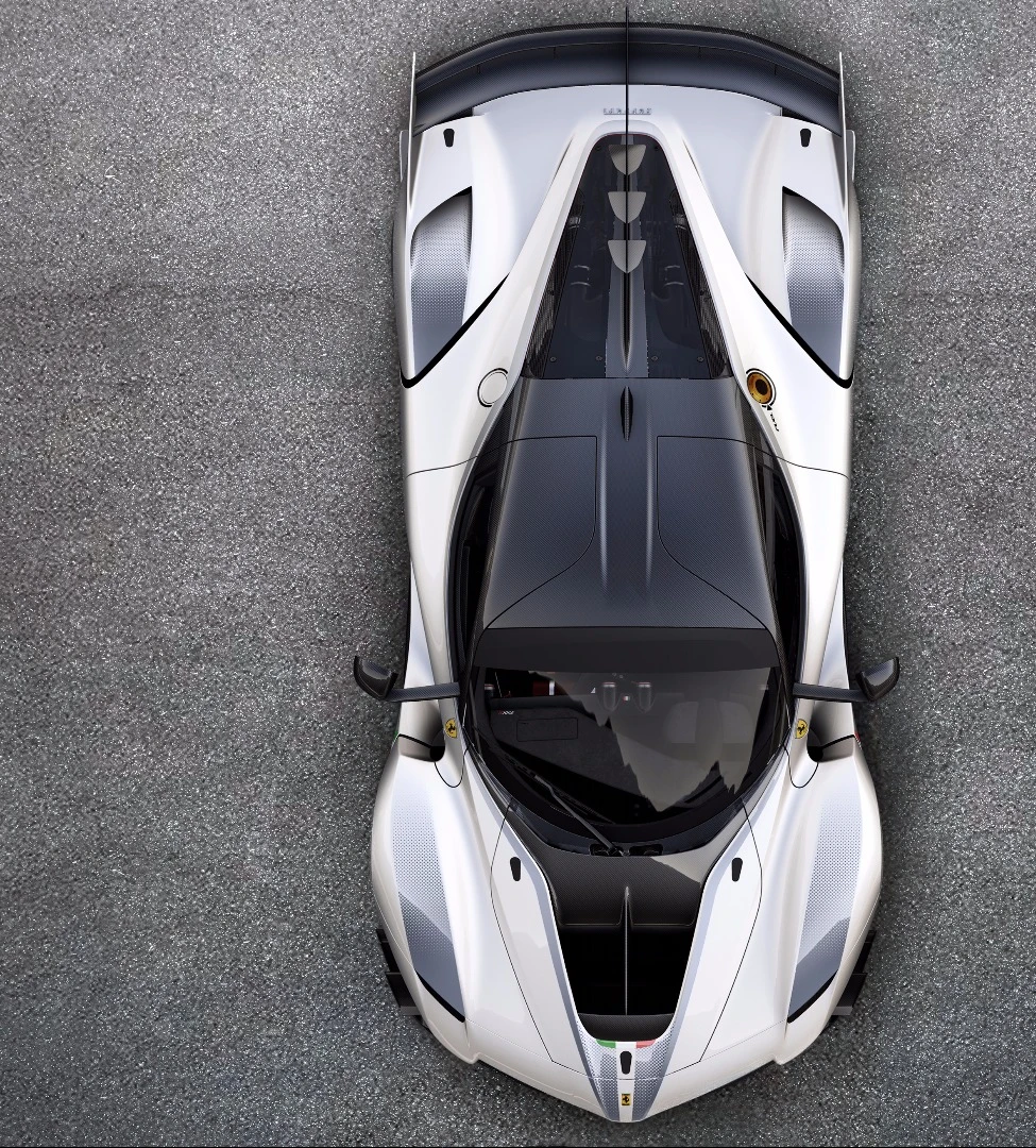 2018 Ferrari FXX-K Evo: triangular, aerodynamic vortex generators on the centre of the rear "shark fin" help clean the airflow off the radiators and direct it more efficiently to the fixed rear wing