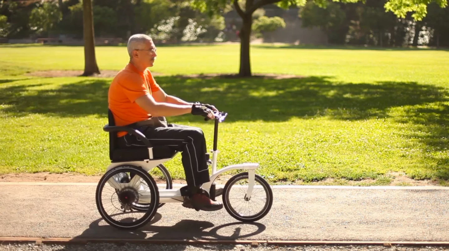 The RoTrike is a human-powered scooter that is rowed by pushing and pulling on a central lever