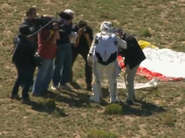 Baumgartner with members of the recovery crew after a near-perfect skydive (Photo: Red Bull Stratos)