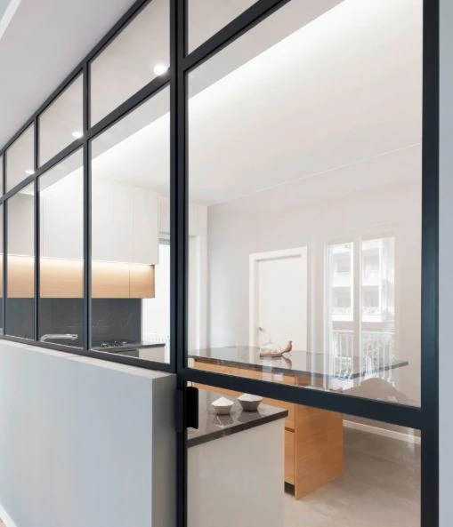 The architects included a gorgeous custom-made iron glass feature wal