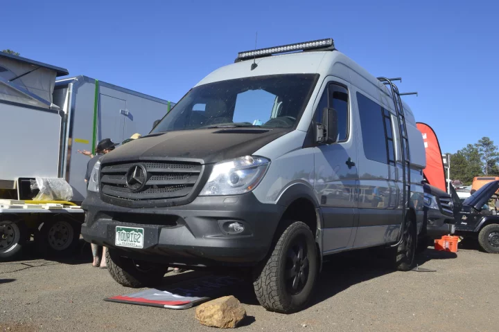 TouRig's Terracamper Sprinter has a folding bed like the Vansports Camper, also a Terracamper-based conversion, but without the greater tuner-car, high-performance aesthetic