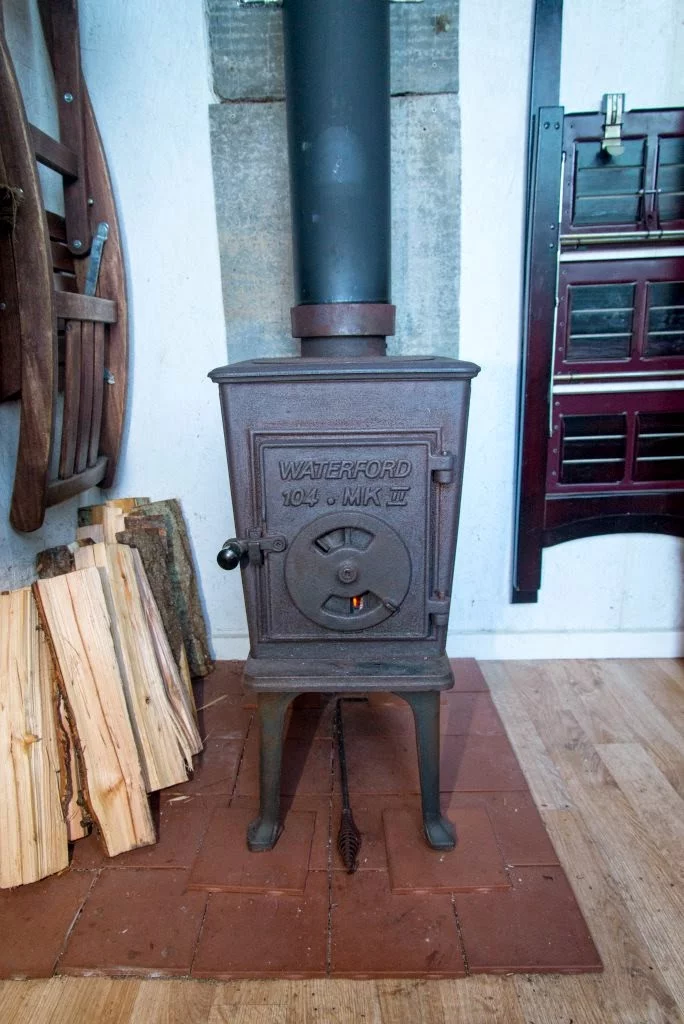 A wood-burning stove provides heat (Photo: Scott Brooks/Brendan McGarry Photography)