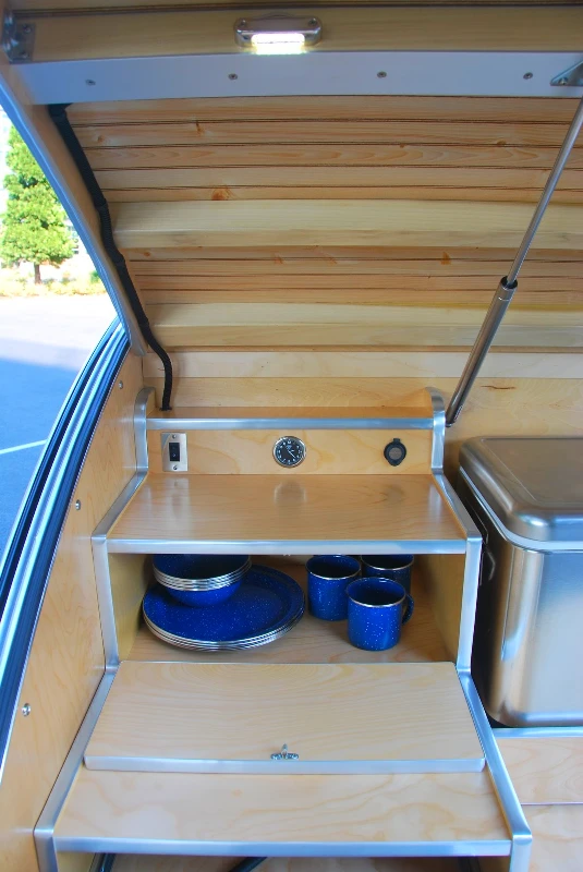 The galley includes two cabinets for storage