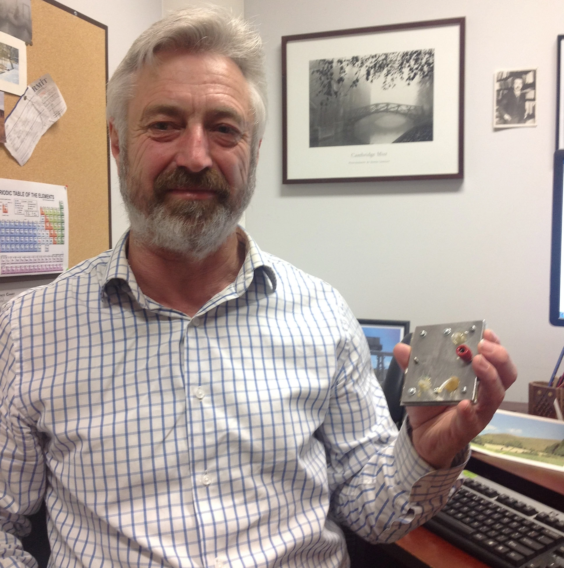 Associate Professor John Andrews with an experimental preliminary proof of concept proton flow battery system (Photo: RMIT)