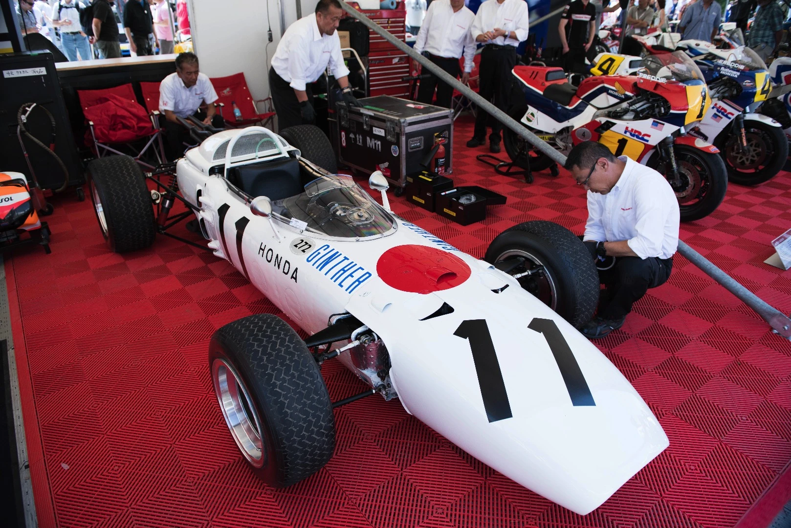 Honda’s 1965 RA272 Formula One racing car featured a 48-valve 1,500 cc V12 engine which produced 230 hp. The engine was safe to 14,000 rpm, which was unusually high for a 1960s engine design. Richie Ginther led the 1965 Mexican Grand Prix from start to finish in the RA272, in so doing becoming the first driver to take a Japanese car to victory a Formula One Grand Prix.
