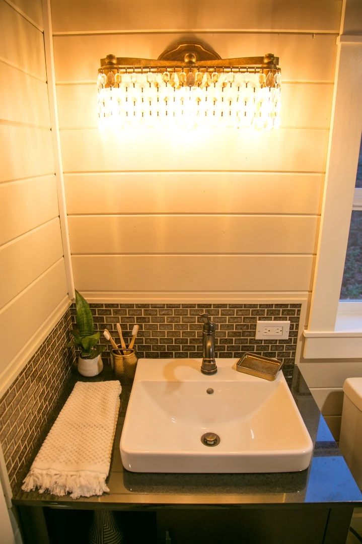 The Theater Home's bathroom also includes a sink