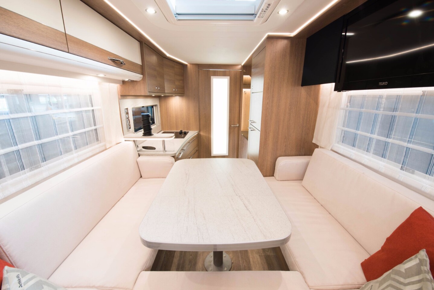Dethleffs focuses more on the technology behind the e.home, not so much the traditional motorhome amenities, but we're assuming the dining set transforms into a bed