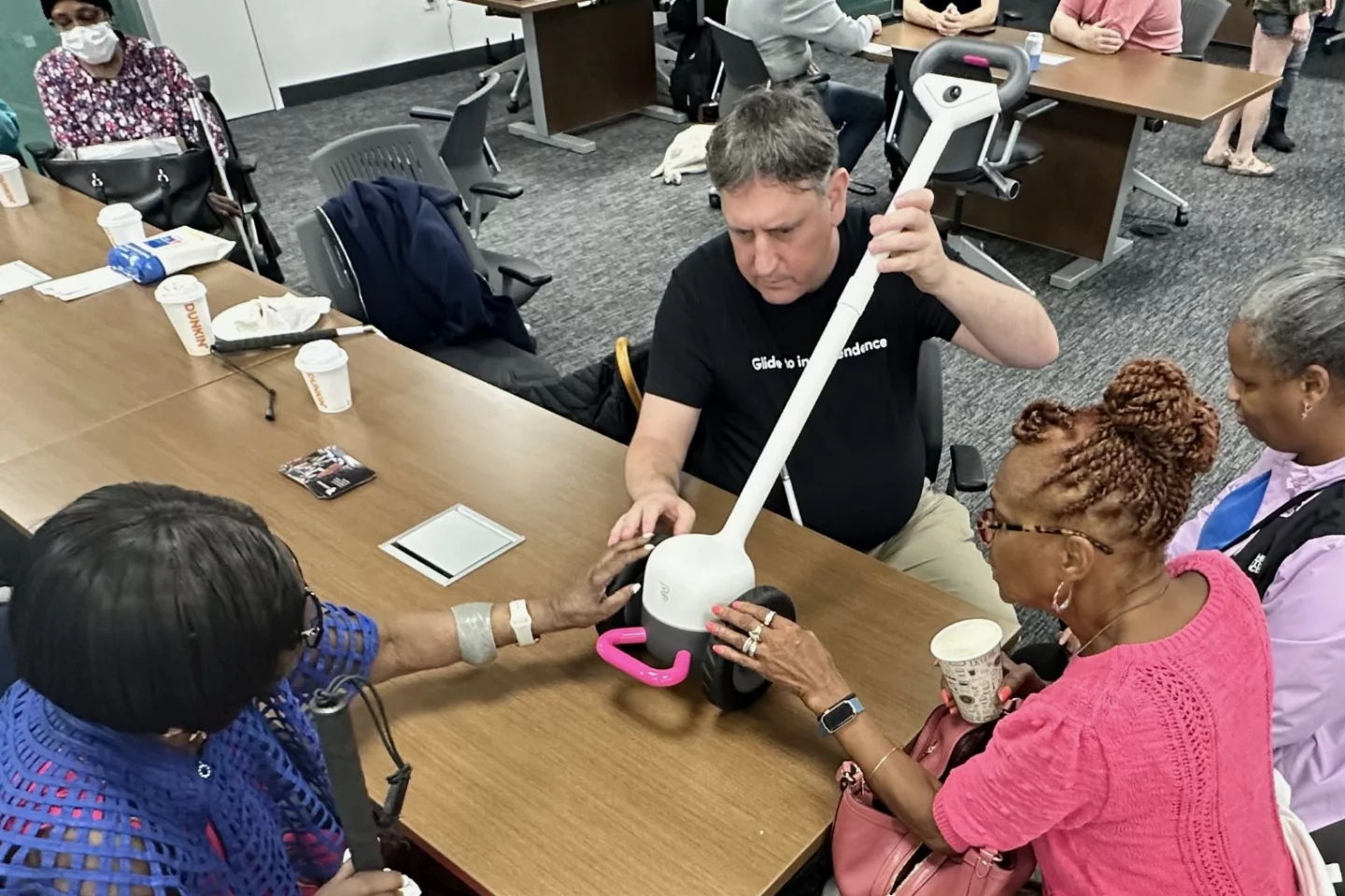 Volunteers check out a Glide prototype