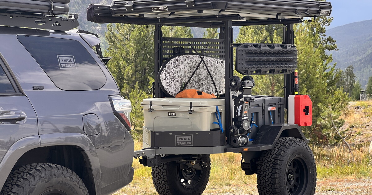 Skeletal micro-trailer mods from bare gear deck to towering base camp
