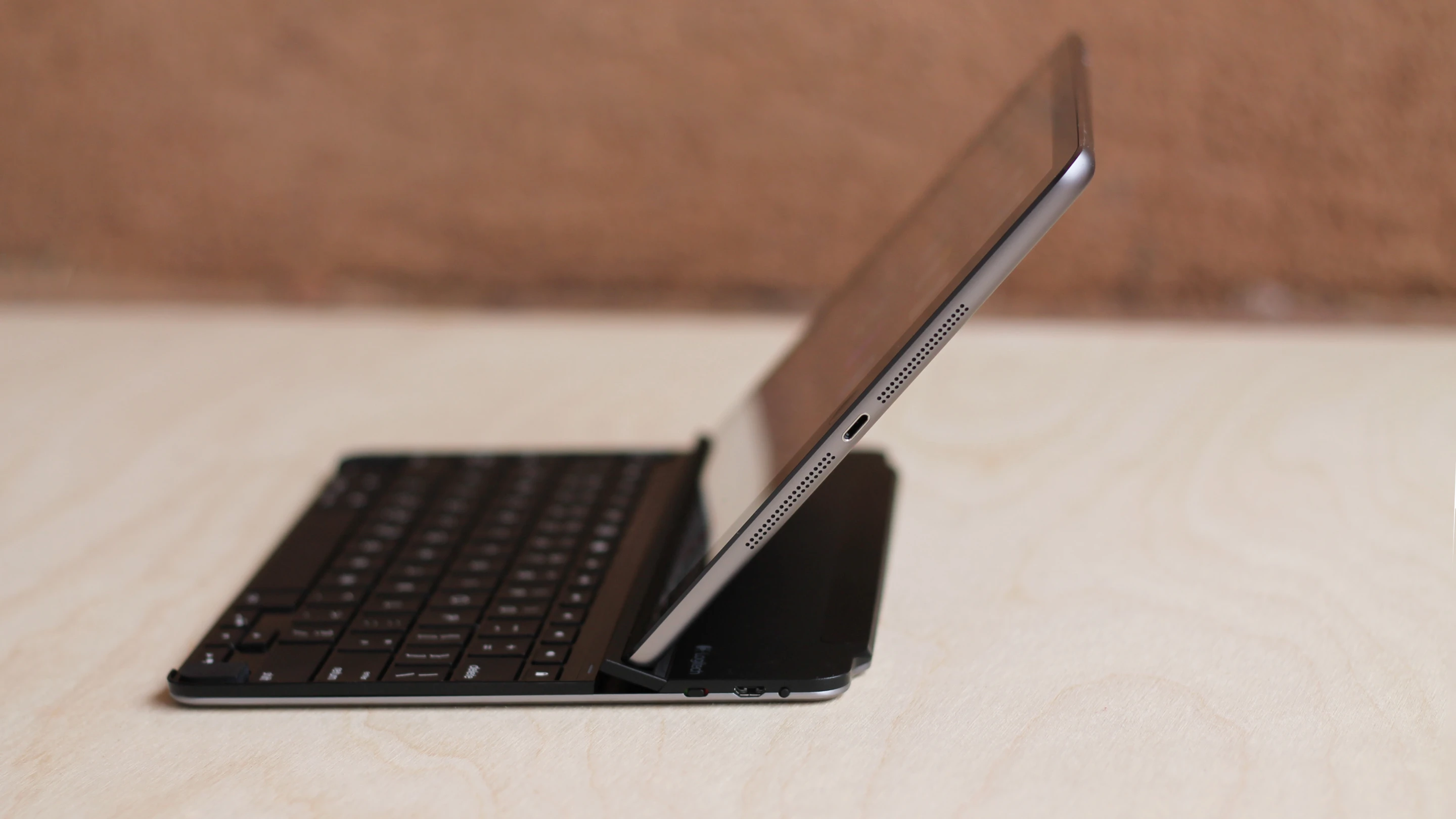 With the Logitech cover, you can adjust the iPad's angle, when in laptop mode