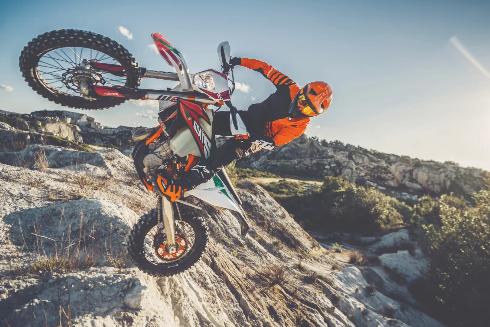 The 2020 KTM 450 EXC-F (Six Days edition) at an improbable angle. If you or I found ourselves at this angle, hospital would soon follow