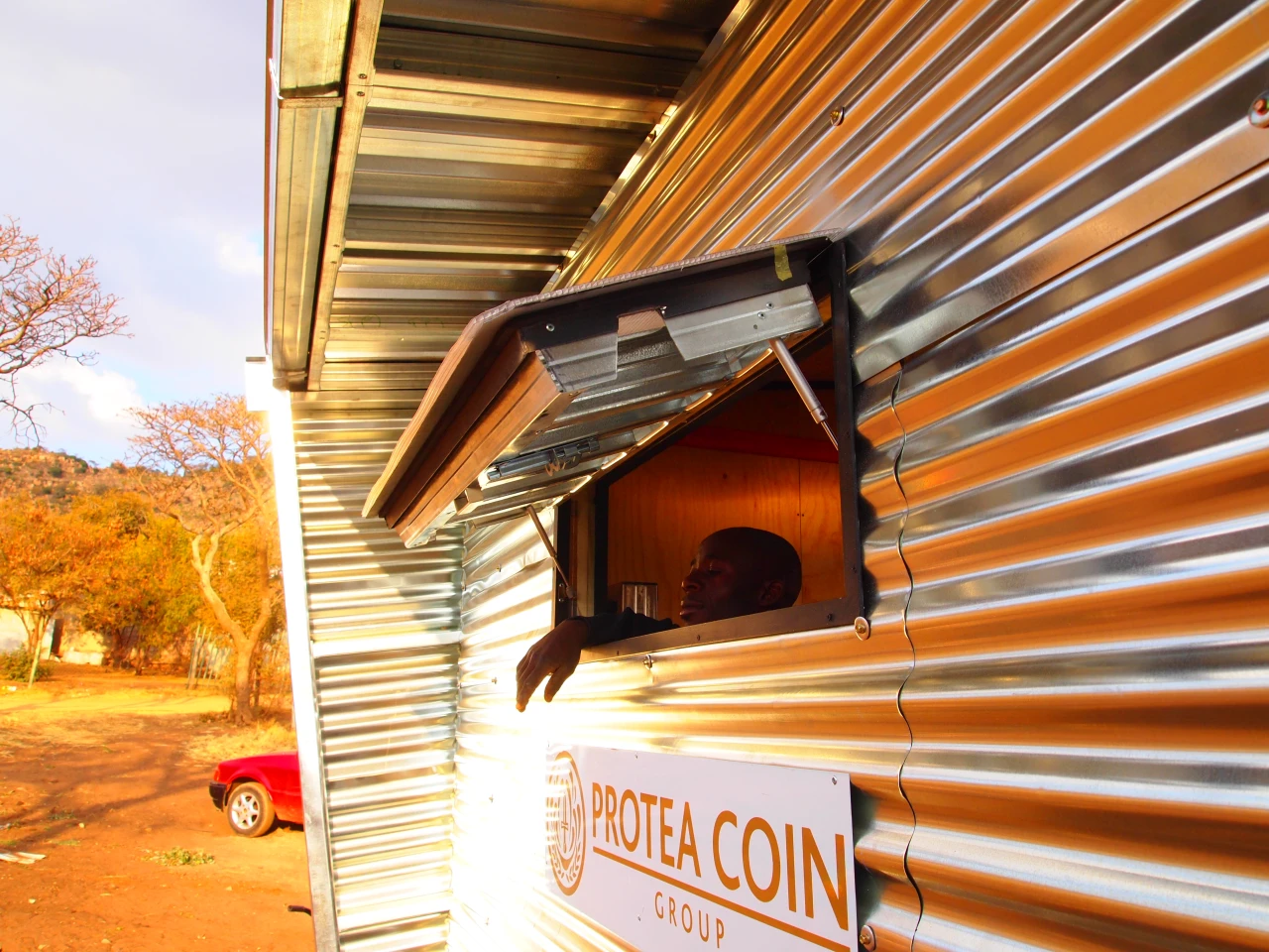 The Mamelodi Pod uses zinc cladding like the more common temporary structures, but includes design features like windows, skylight and roof shade (Photo: Architecture for a Change, from the forthcoming book "Superlight")