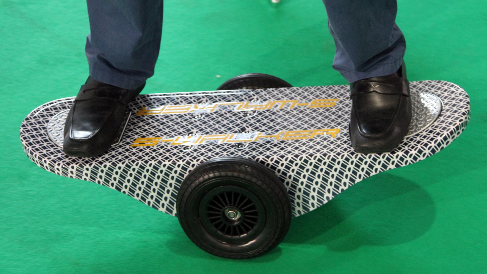The S-Walker Board combines aspects of a Segway, a balance board and a skateboard