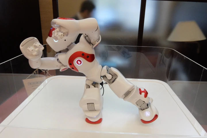 Standing just 58 cm (23 in) high, NAO was given a plinth to put him on eye level with the costumers he greeted (Photo: Stephen Clemenger/Gizmag.com)
