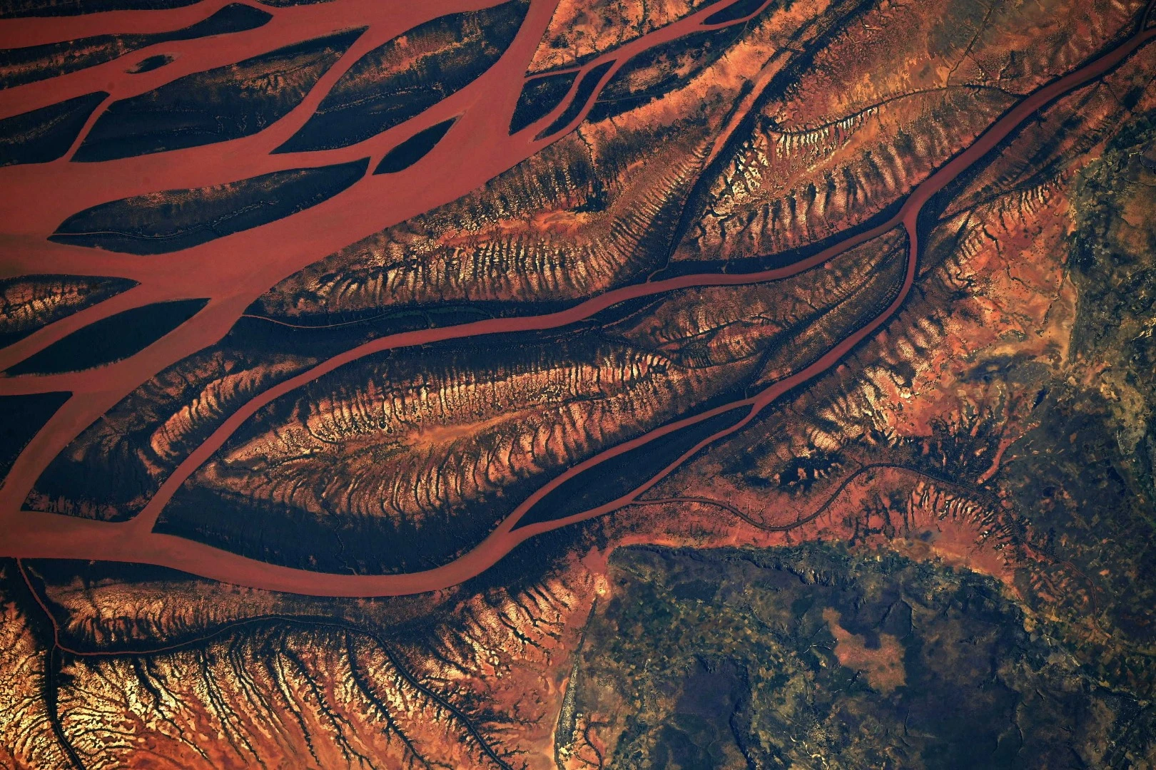 A striking image of the heart of Madagascar, as decimation of rainforests and mangroves causes more water to drain into the sea