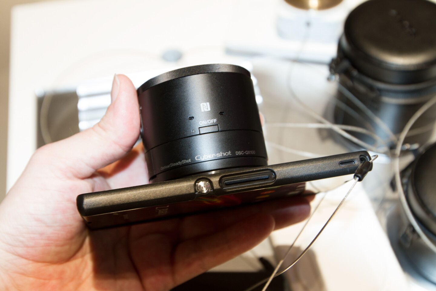 The Sony Xperia Z1 with the QX-100 lens-style camera