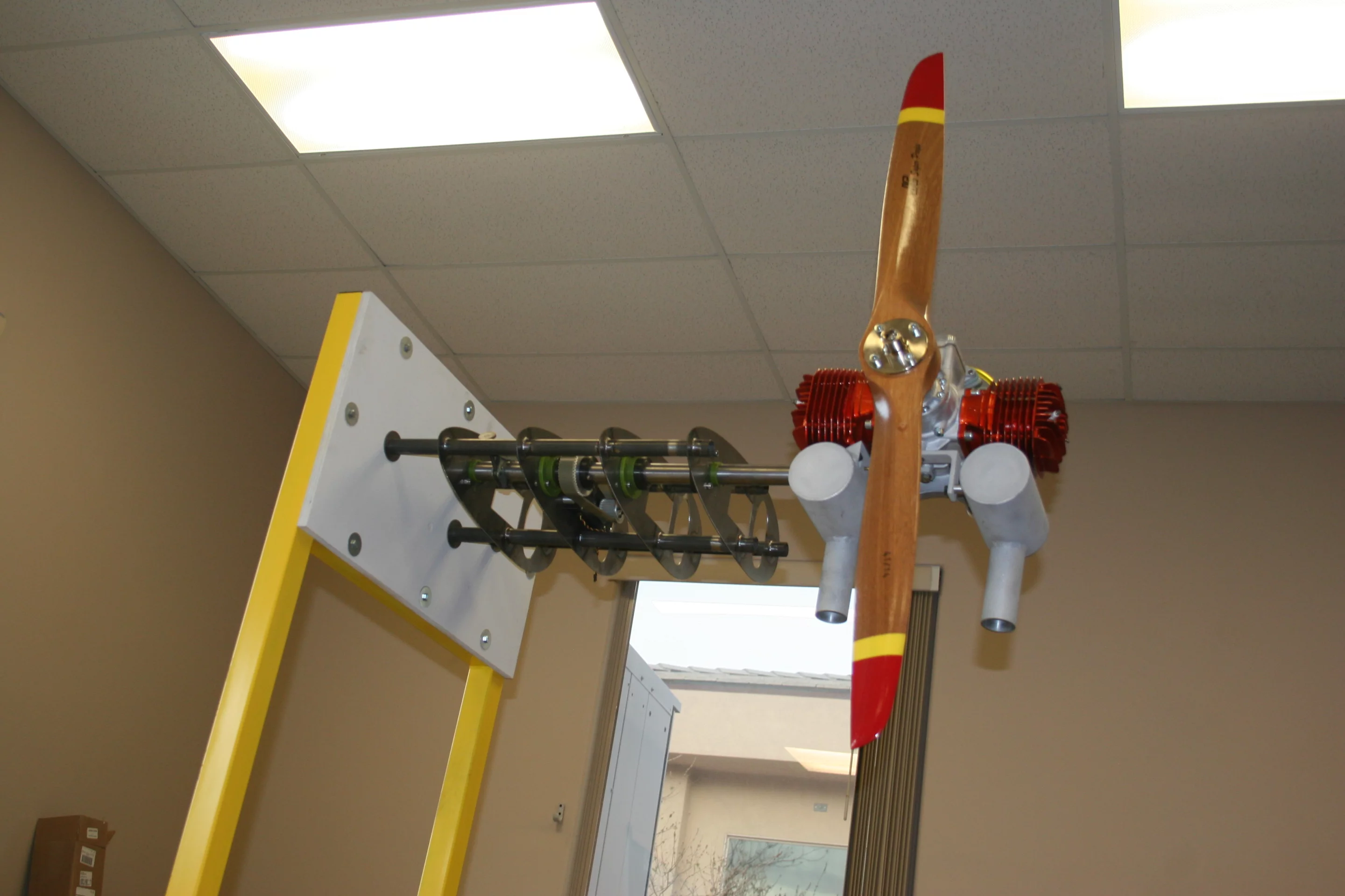 This engine and propeller assembly can be rotated via a pivot assembly to provide vectored thrust for takeoff and landing of the UAV airship