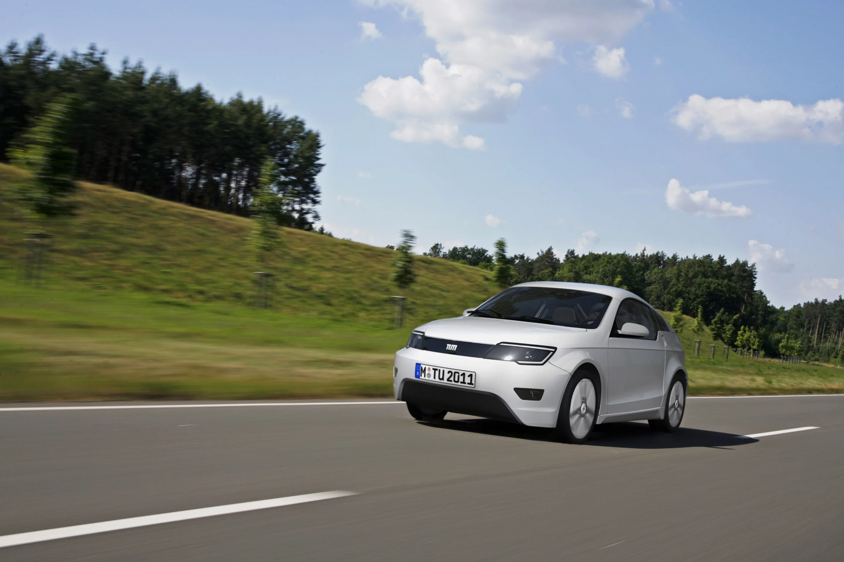 The MUTE concept electric coupe includes a built-in range extender, features interesting innovations to help keep weight down without adversely affecting vehicle safety, and can be made at a cost equivalent to similar-sized combustion engine vehicles