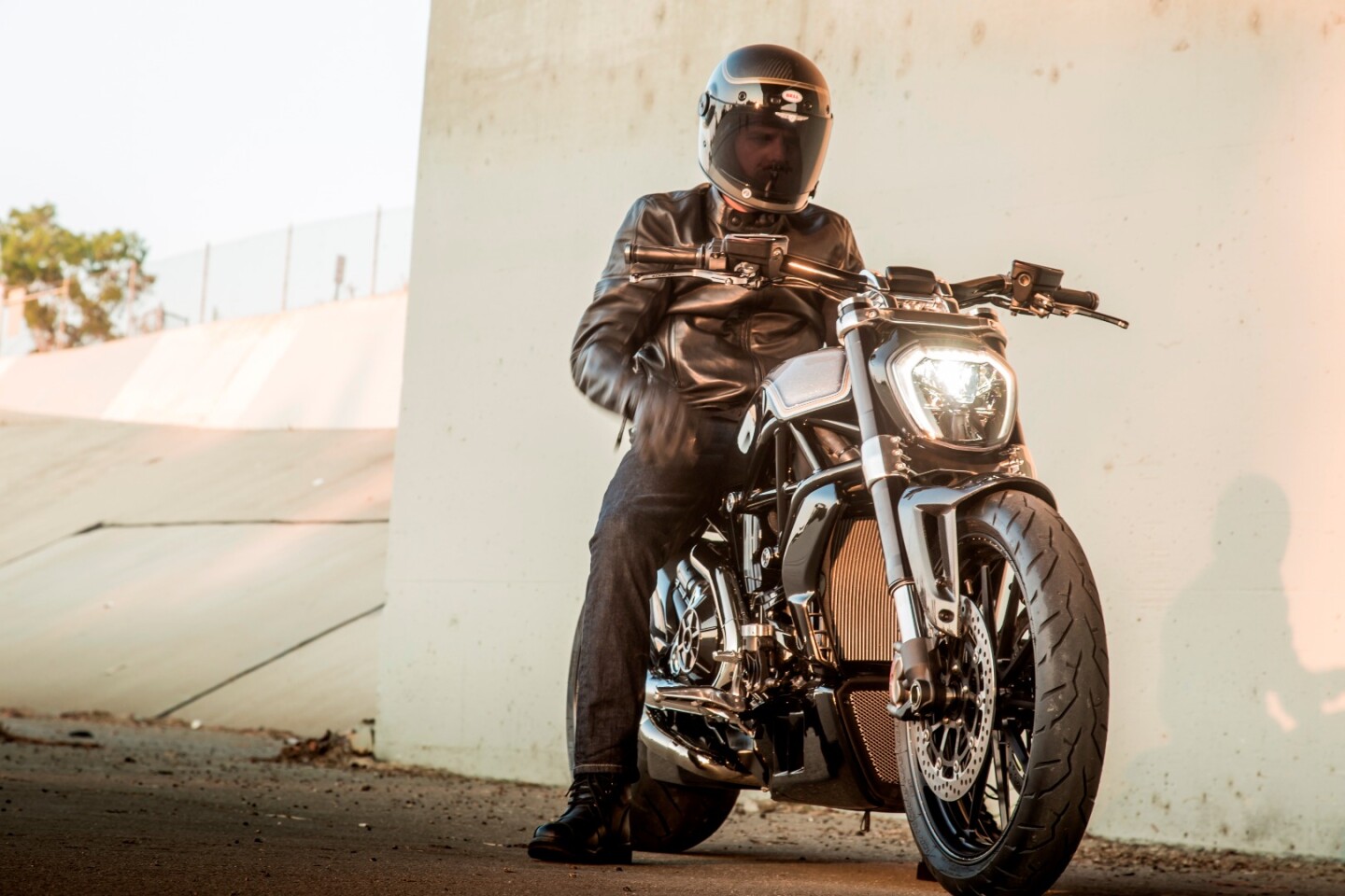 XDiavel by Roland Sands: stock headlight remains, but it's framed by sexier polished triple clamps and a slightly larger 19" front wheel