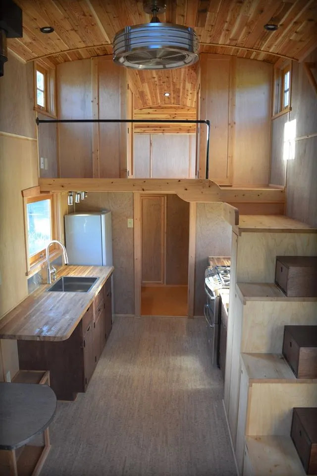 Entering via the hand-built dutch doors, visitors find a 9 x 24 ft (2.7 x 7.31 m) main floor, plus a 9 x 13 ft (2.7 x 4 m) loft