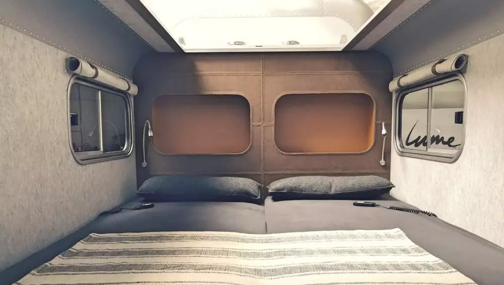 Lume's Traveler interior is made from stylish, high quality materials like wool, leather and wood