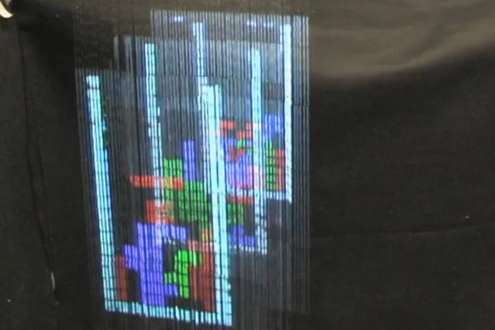A multi-dimensional Tetris game on the AquaLux 3D