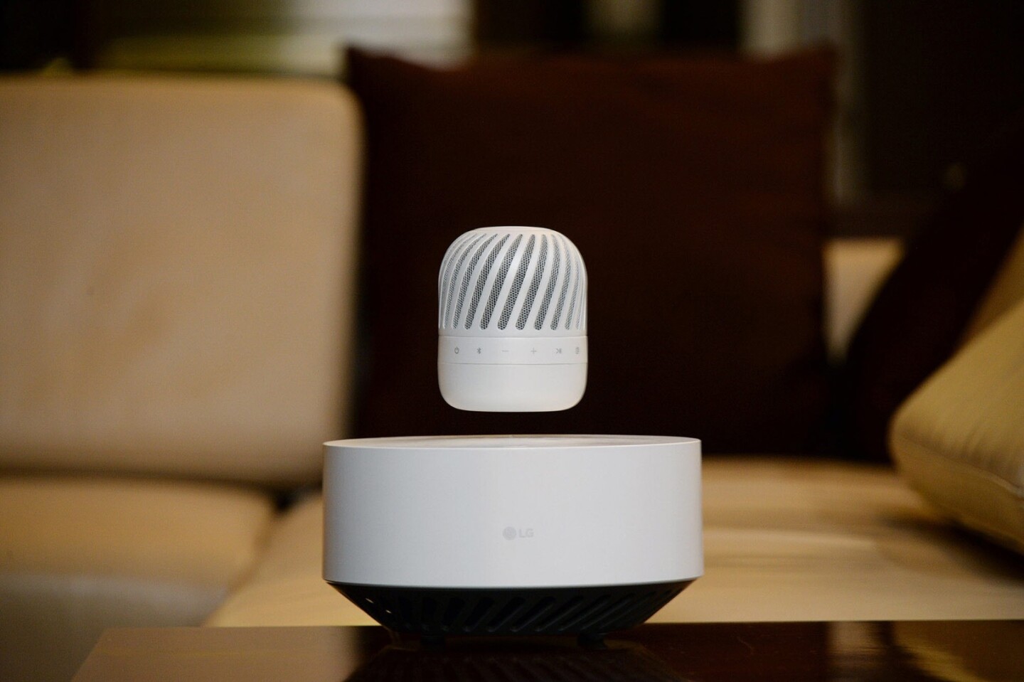 When the PJ9's battery begins to get low, the floating part of the speaker system will automatically descend to the base station and begin to charge wirelessly, without needing to stop music playback