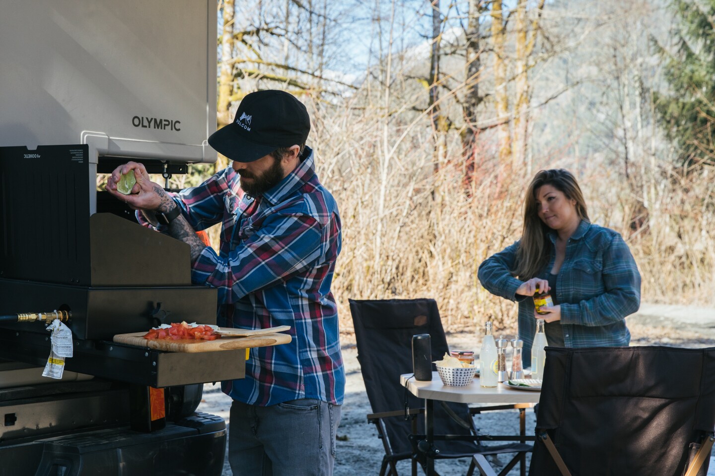 The available outdoor worktop holds the stove and cutting board for outdoor cooking