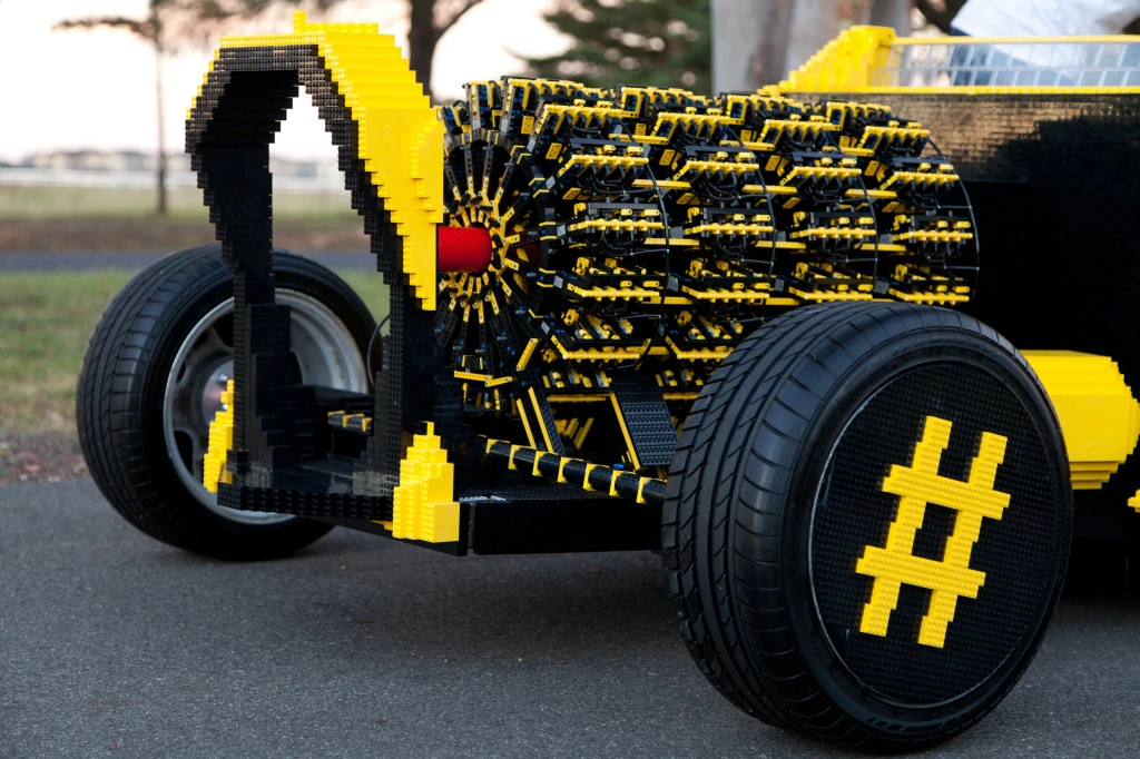 The Lego roadster is air-powered by 256 pistons inside 4 orbital engines ... no power ratings were divulged at this time