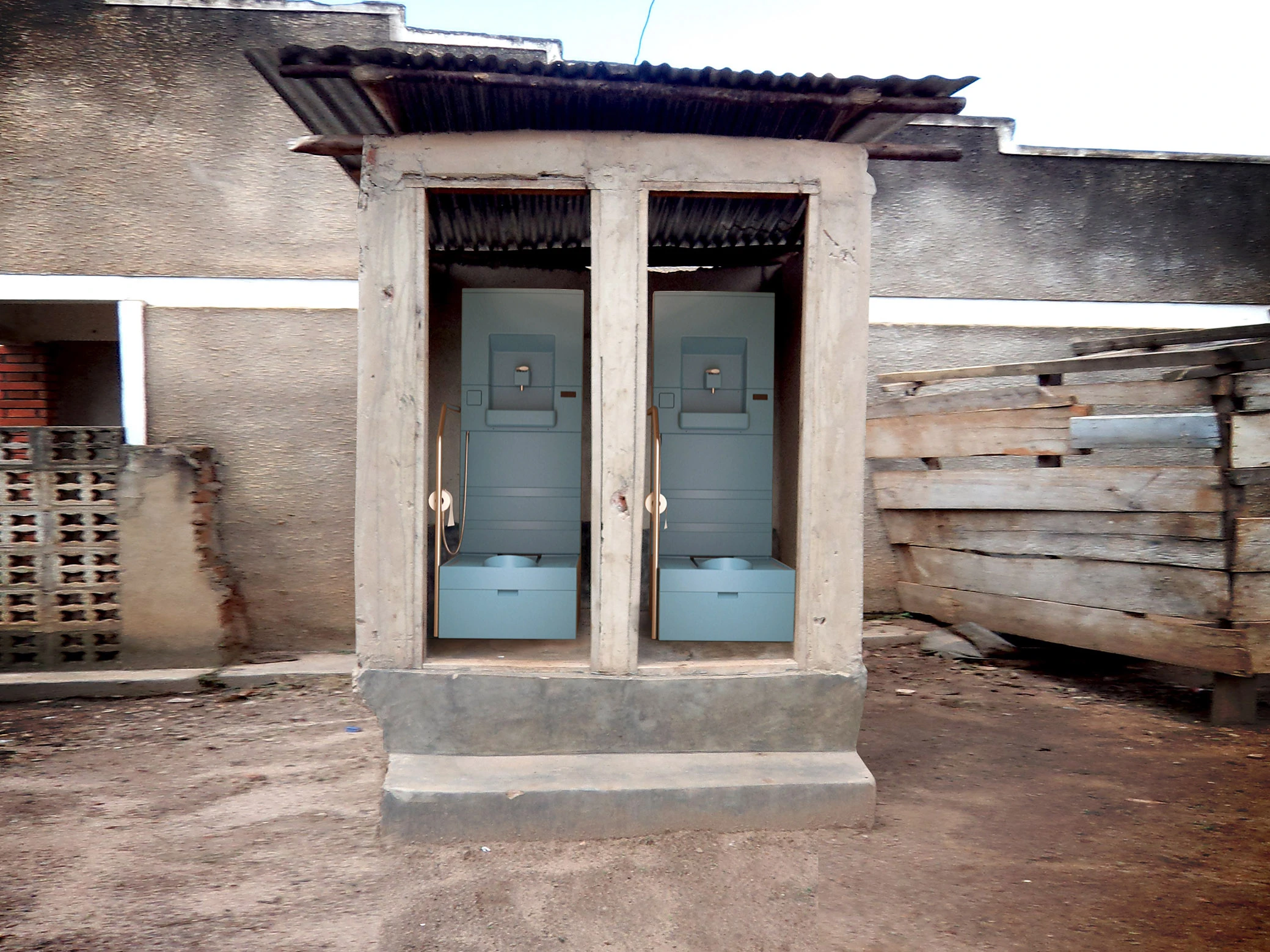 A pit latrine retrofitted with two Blue Diversion toilets
