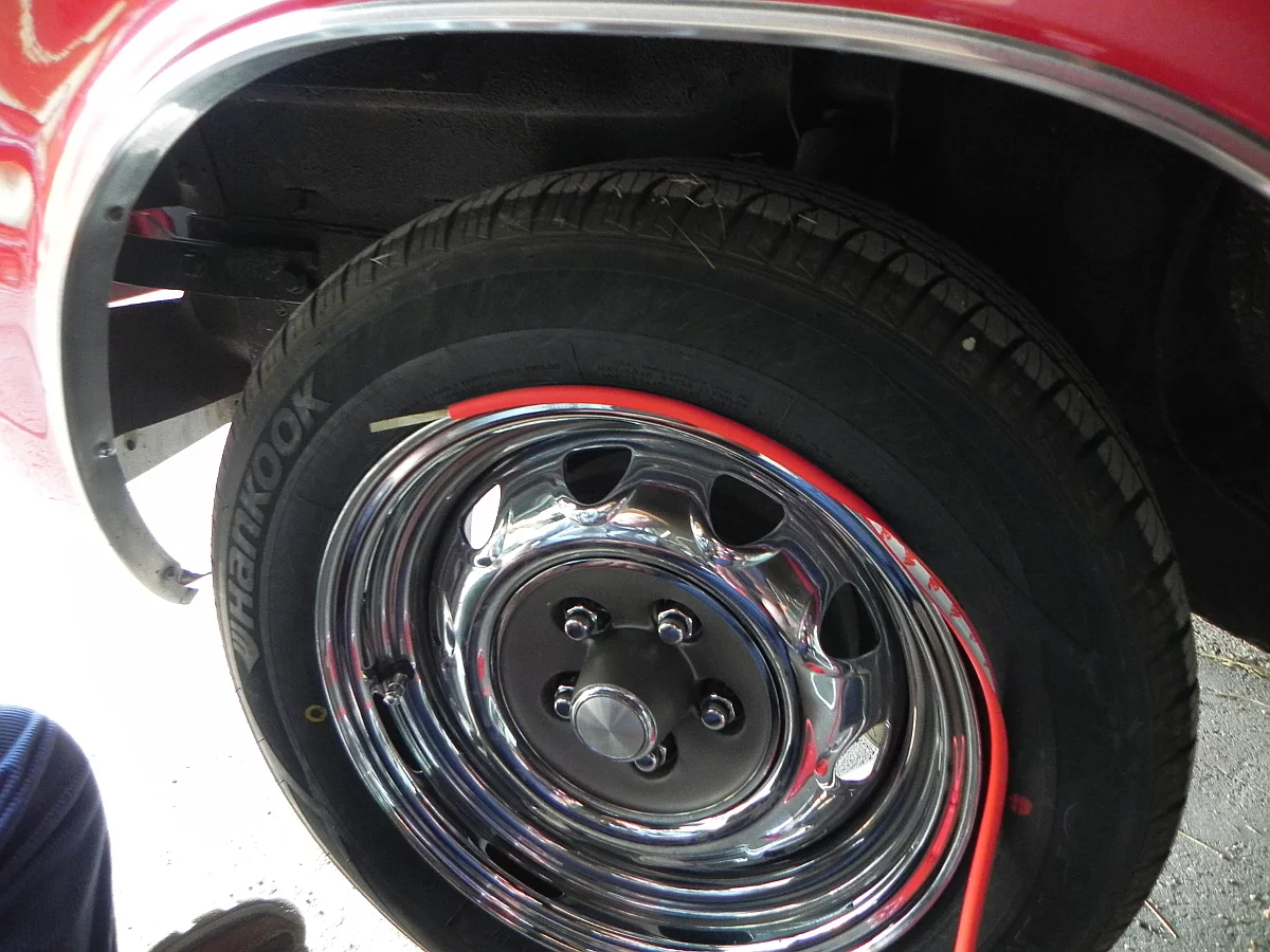 We try a dry fit to see which side of the RimBlades will fit best on the Dart's wheels