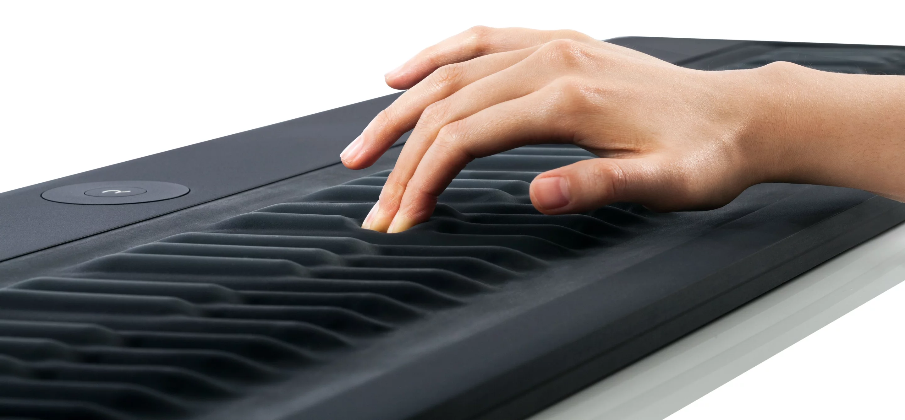 The raised "keys" flex under a player's touch for pressure-sensitive volume and timbre adjustment and dynamic pitch modulation