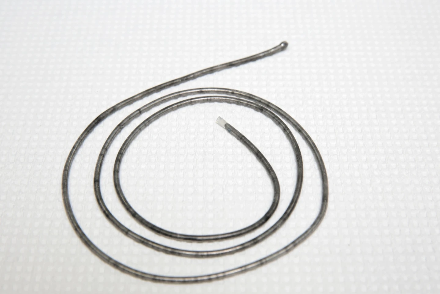 When an electrical current is passed up and down the wire it heats up the alloys inside the tube